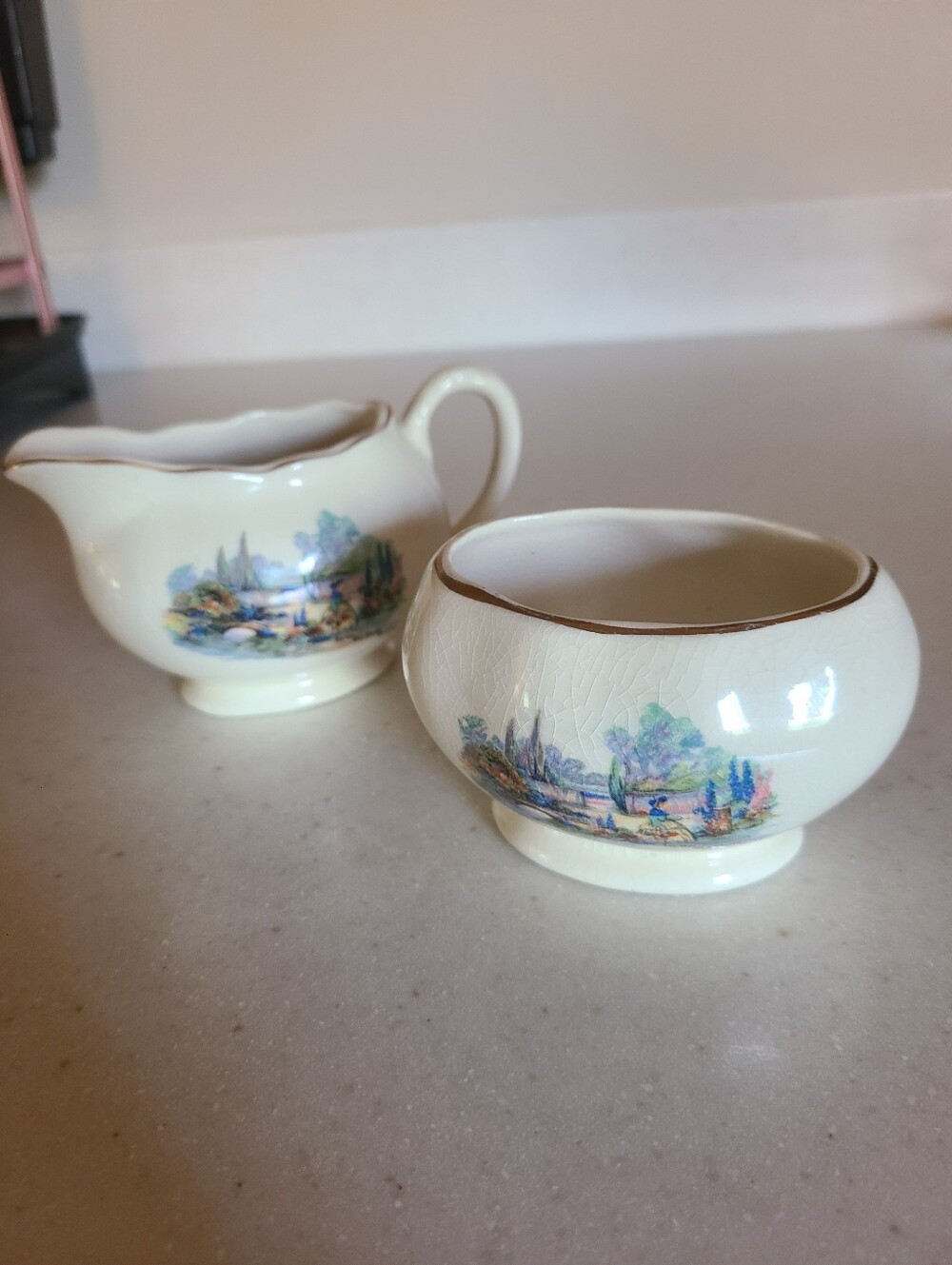 Ivory Ceramic Creamer and Sugar Bowl Set with Pastoral Scene